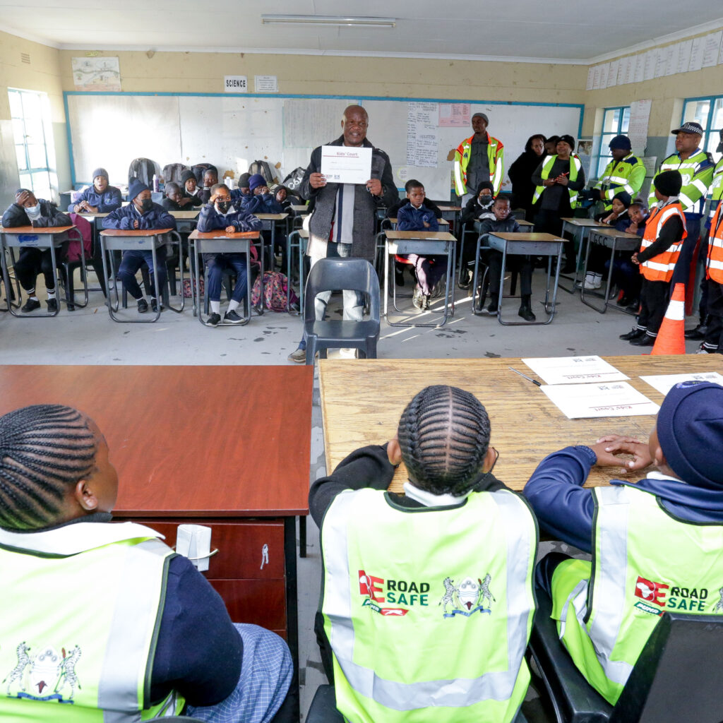 Kids' Court "judges" with a driver in Botswana